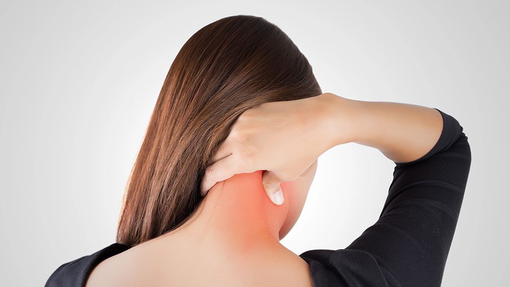 Woman suffering from chronic neck pain