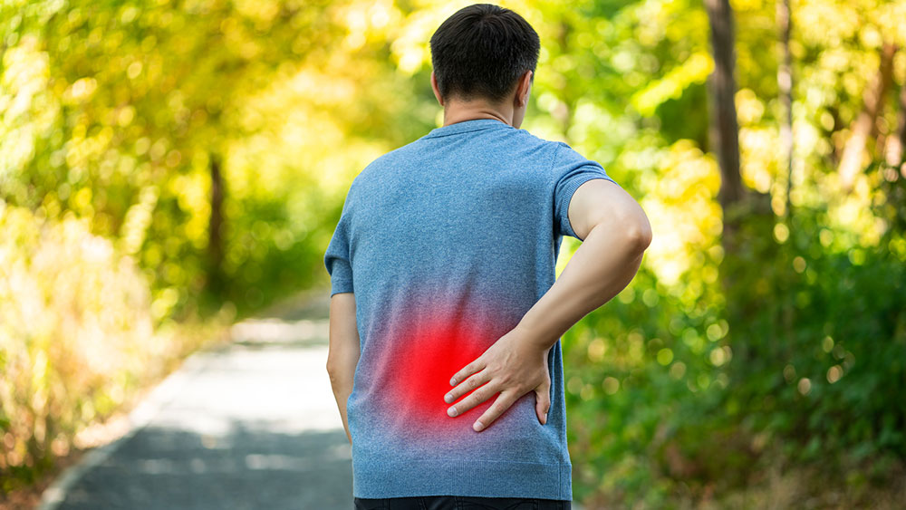 Man suffering low back pain